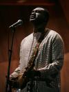 Photo of Malian musician Bassekou Kouyate on stage at his concert at Gut Bennigsen estate grounds in Bennigsen, Germany.