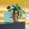 Herr Menig retail glasses display mockup including amorphus blue character wearing glasses and hiding behind a potted plant