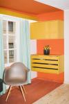 herr menig optik junior retail interior taken by maria bayer. Decor is 70's inspired in hues of teal, yellow and orange