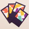 four variations of picpacker business cards fanned out